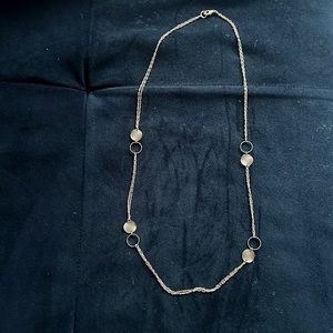 Silver chain with brush metal circle detail. 20” long, adjustable